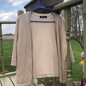Short, beige cardigan in great shape